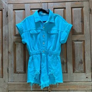 Gorge blue romper with fringed bottoms